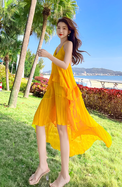 Yellow V-neck design backless dress tutu skirt irregular pleated beach suspender dress R0200