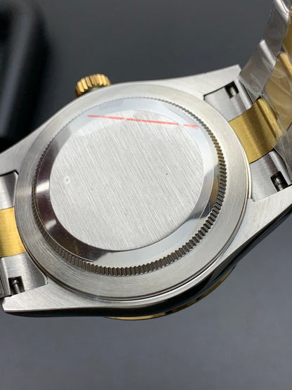 SKY DWELLER GOLD STEEL BLACK DIAL