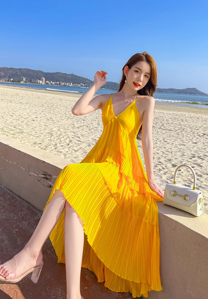 Yellow V-neck design backless dress tutu skirt irregular pleated beach suspender dress R0200