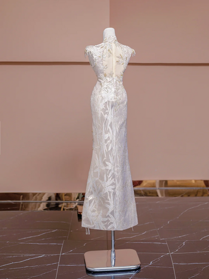 Light champagne-colored sleeveless, fitted ball gown/bridal dress with a Chinese neckline R8346