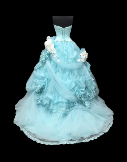 Light blue strapless ball gown with a cinched waist and a voluminous puffy skirt; bridal gown R7301