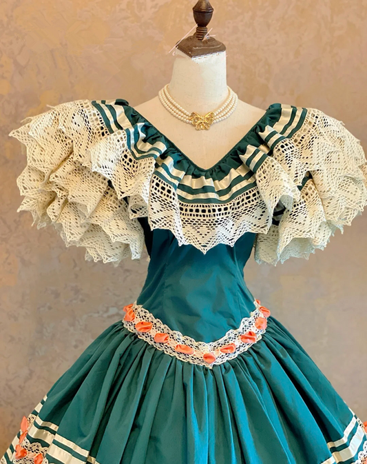Green V-neck floor-length ball gown with a cinched waist, classic style and tiered cake skirt; bridal gown R7306