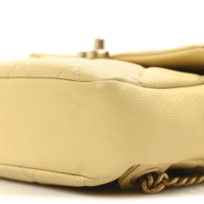 Shiny Caviar Quilted Chain Melody Backpack Yellow