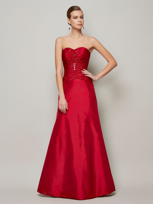 A-Line/Princess Sweetheart Sleeveless Beading Long Taffeta Dresses