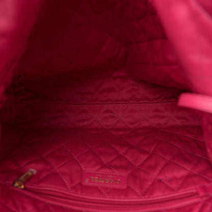 Shiny Calfskin Quilted Small Chanel 22 Fuchsia