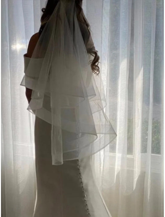 - Single layer contemporary/fashionable wedding dress cathedral veil with tassel chiffon