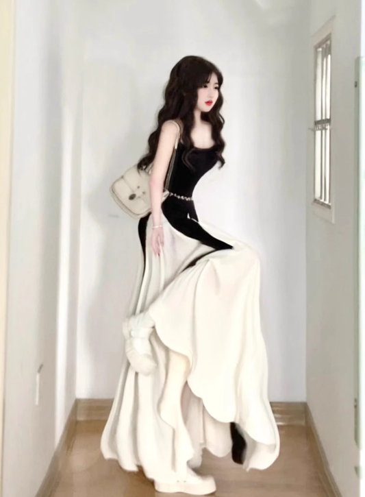 2025 new French black and white contrast suspender dress seaside holiday temperament waist A-line long skirt R0423