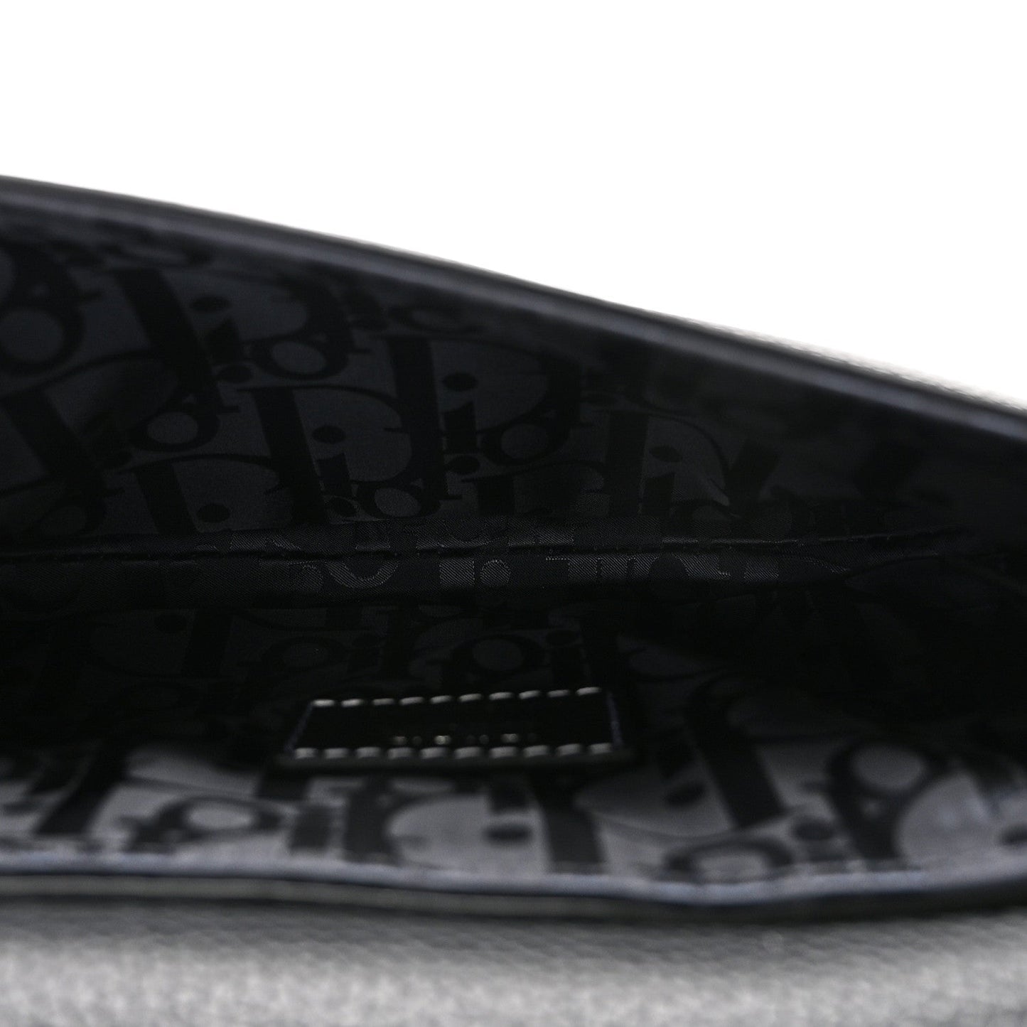 X KAWS Grained Calfskin Saddle Pouch Black