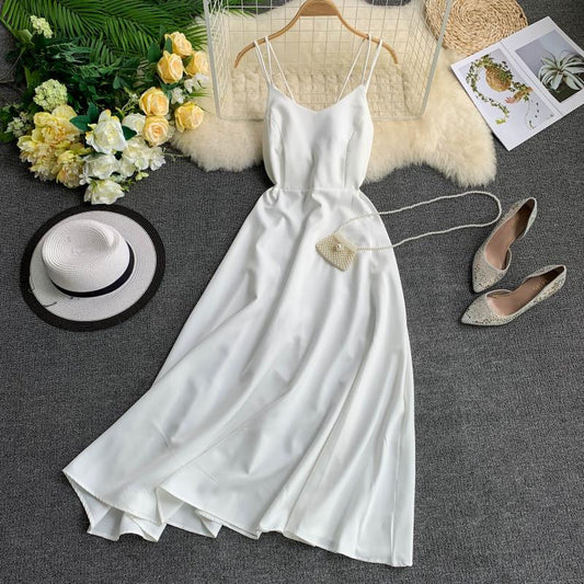 Holiday long dress cross strap backless solid color seaside medium-length swing fairy dress R2311