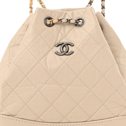 Aged Calfskin Quilted Small Gabrielle Backpack Beige