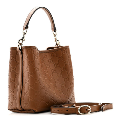 GG Calfskin Embossed Emblem Small Bucket Bag Brown