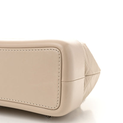 Aged Calfskin Quilted Small Gabrielle Backpack Beige