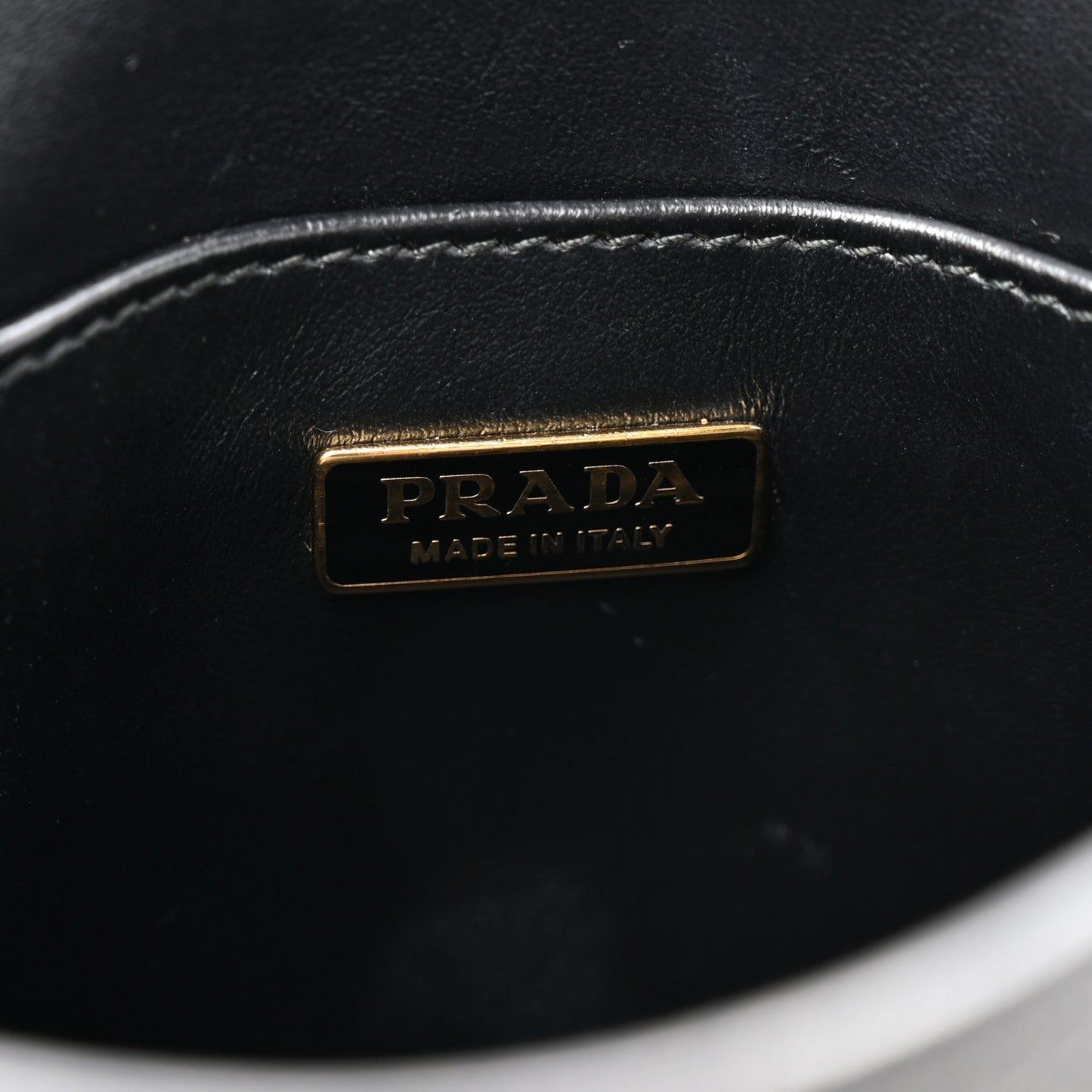 Saffiano Lux Triangle Logo Embossed Small Double Handle Crossbody Tote Black